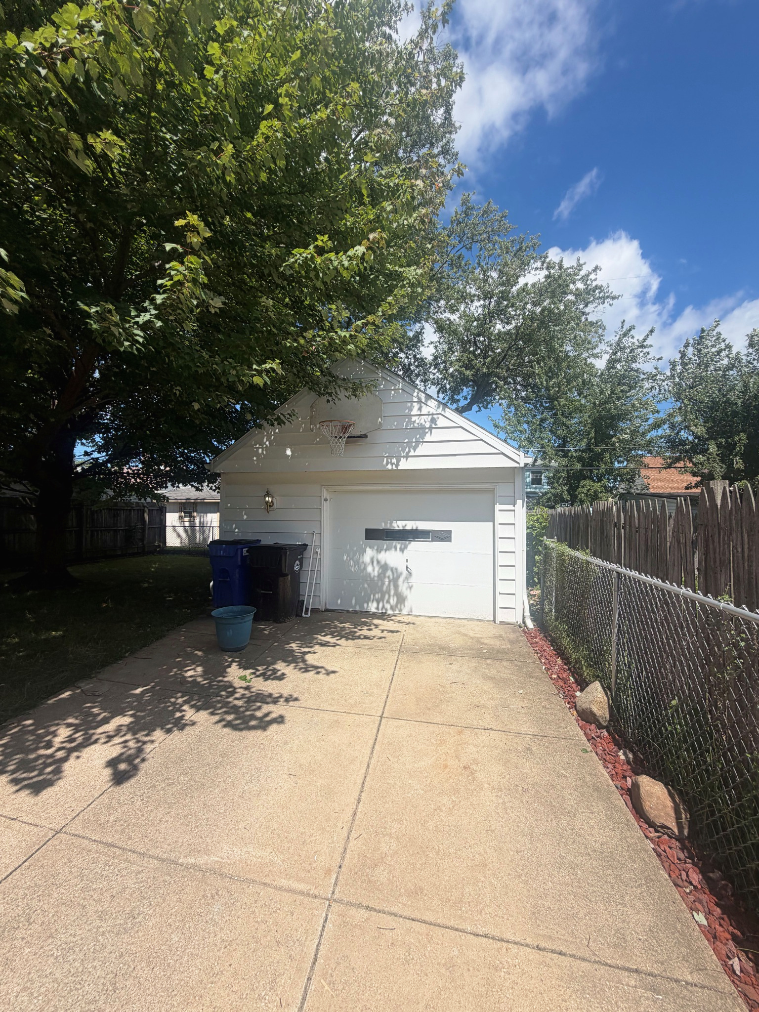 Driveway leading to the detached garage and backyard, Wayland Ave Cleveland renovation