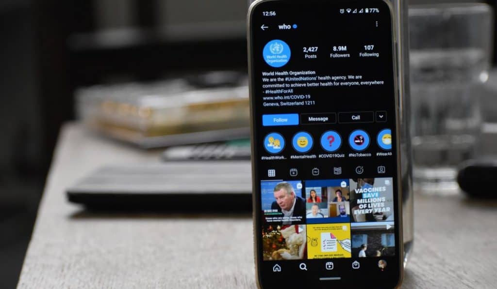 A phone screen showing the Instagram story archive, with a calendar view and a grid of past stories.