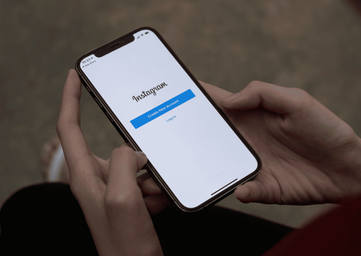 A phone showing the Threads app interface, asking to get the app.