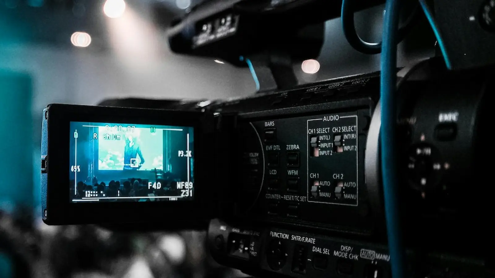 A close up view of a video camera and its playback screen.