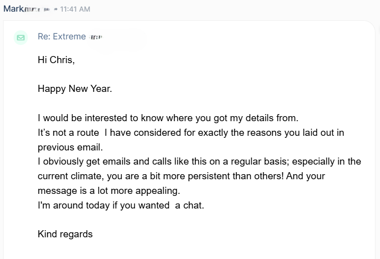 Screenshot of a positive prospect response to a cold email outreach campaign. The reply praises the sender's messaging and persistence, stating 'your message is a lot more appealing' and offering a chat call opportunity.
