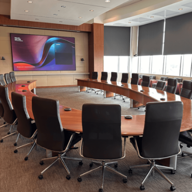 IU Health boardroom with integrated AV conferencing technology by American Sound