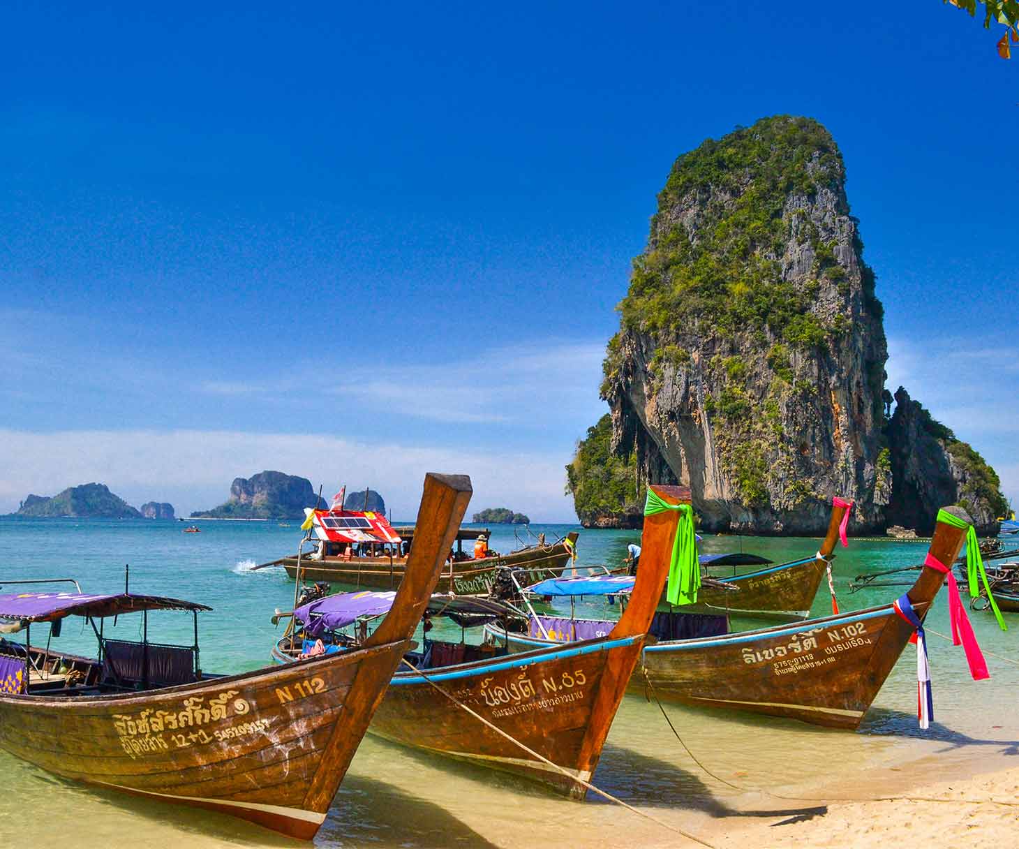 Boats on an iconic beach in Thailand