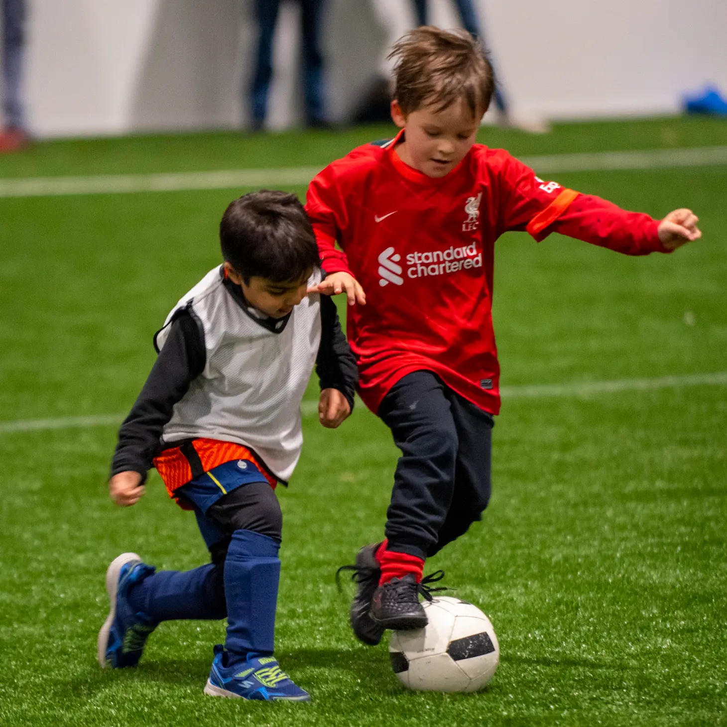 indoor football coaching kids playing football