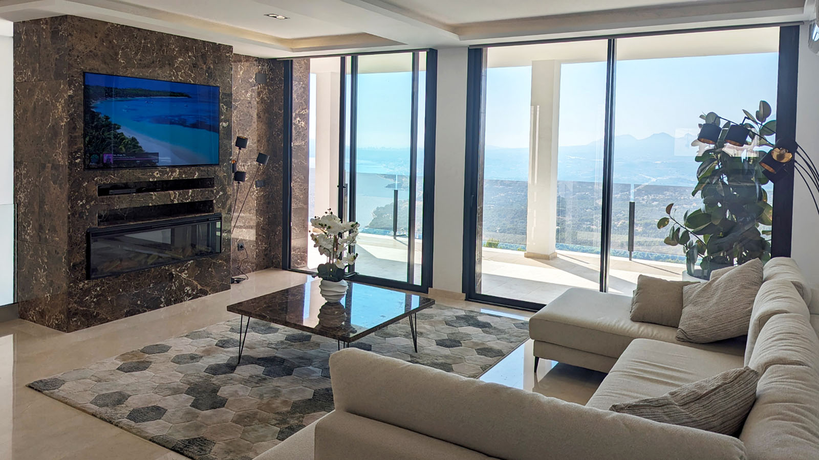 Living room with sea view and designer furniture