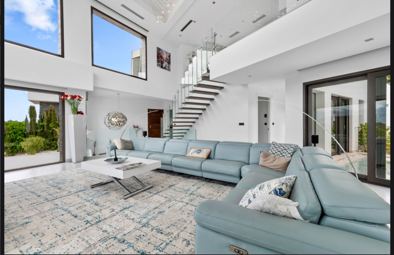 Luxury seafront villa exterior with pool area - premium Costa Blanca real estate