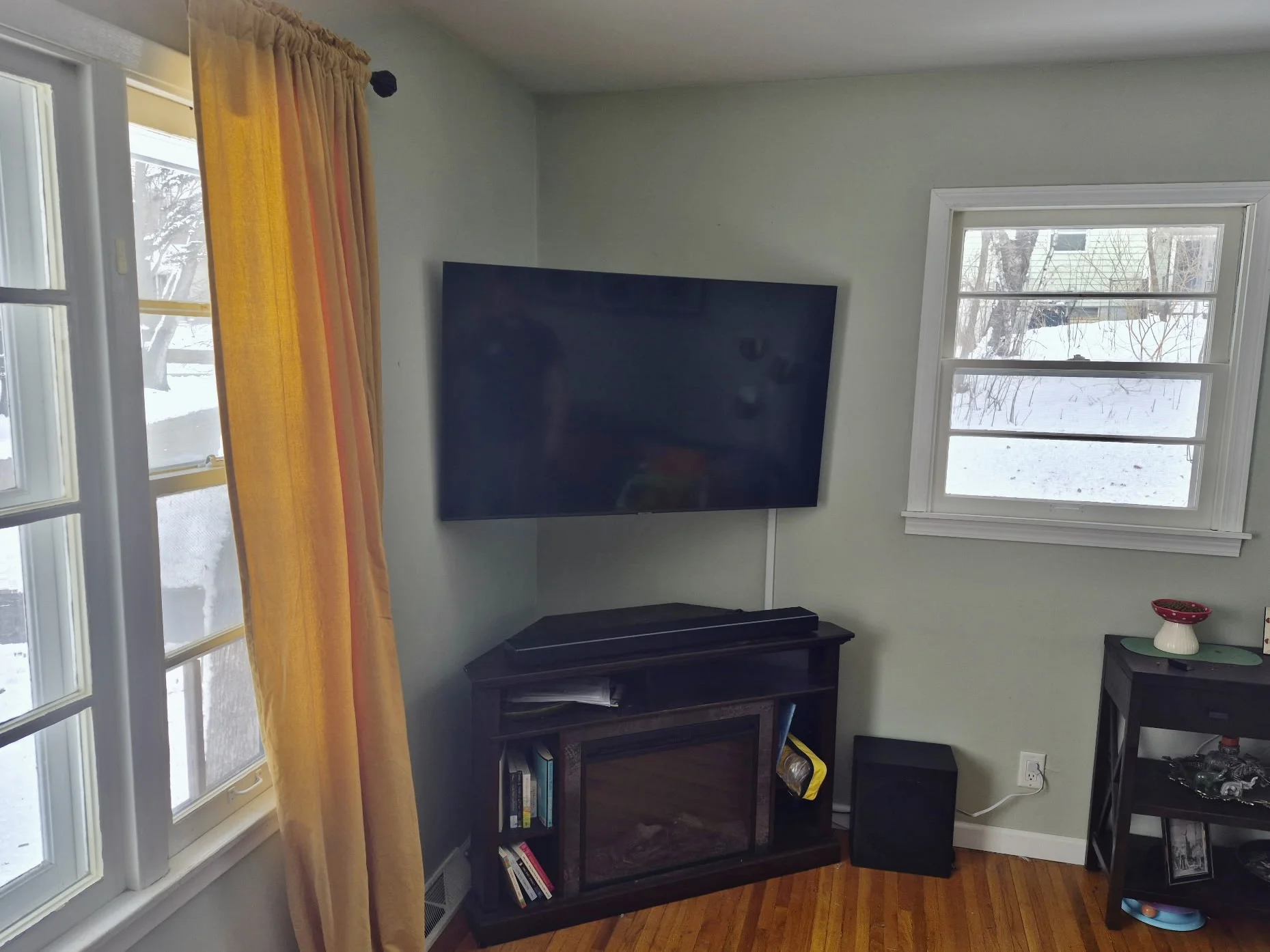 55-inch TV corner installation in Minnetonka with surface-mounted cable concealment