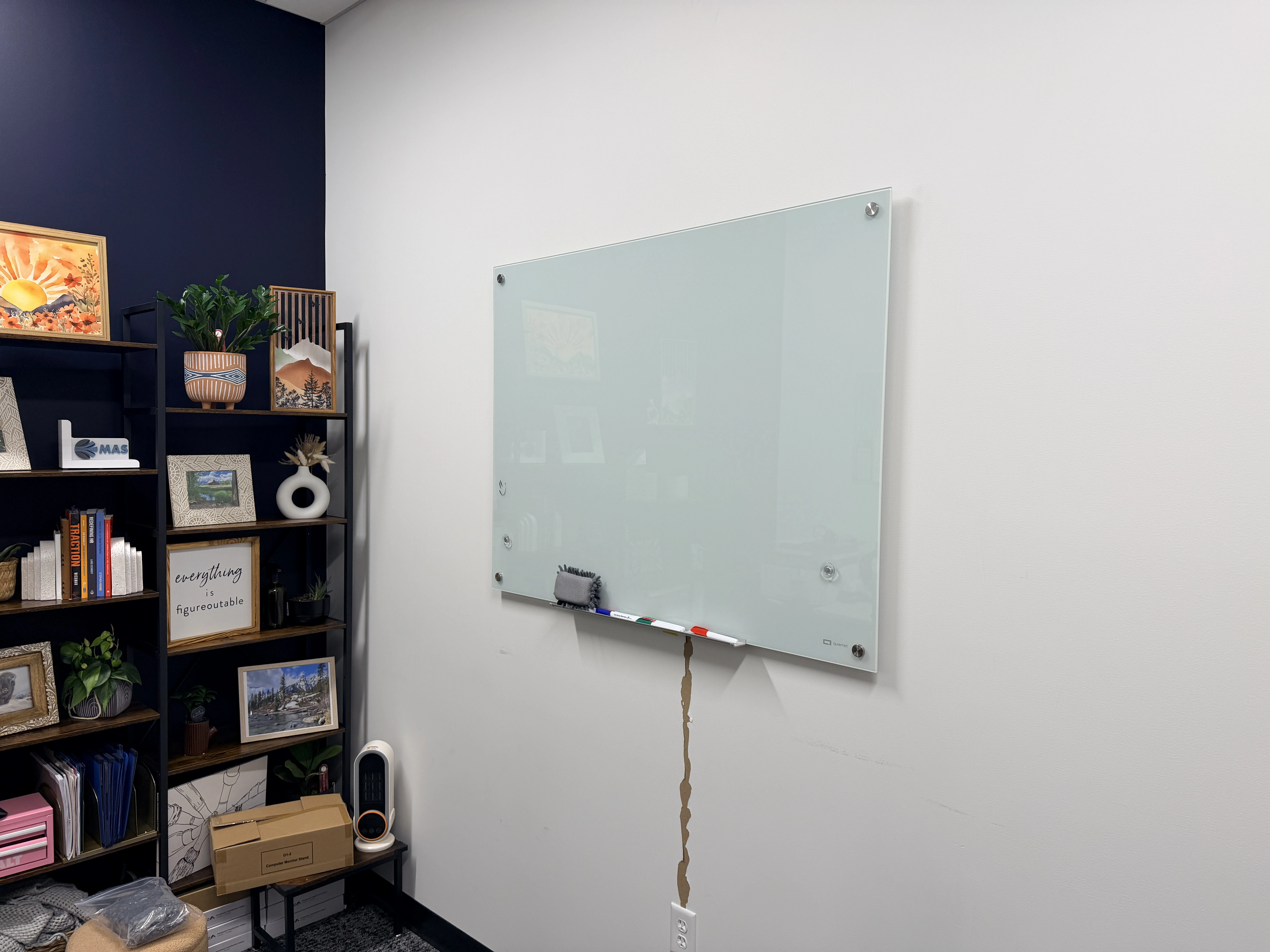 Glass whiteboard mount in Maple Grove office