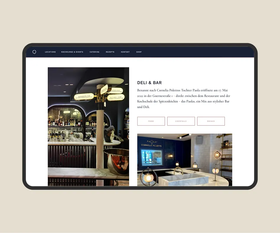 Webseite eines stilvollen Delis und Bars mit Bildern von der Bar und moderner Beleuchtung, inklusive einem Wegweiser mit Entfernungen zu Restaurants und U-Bahn.