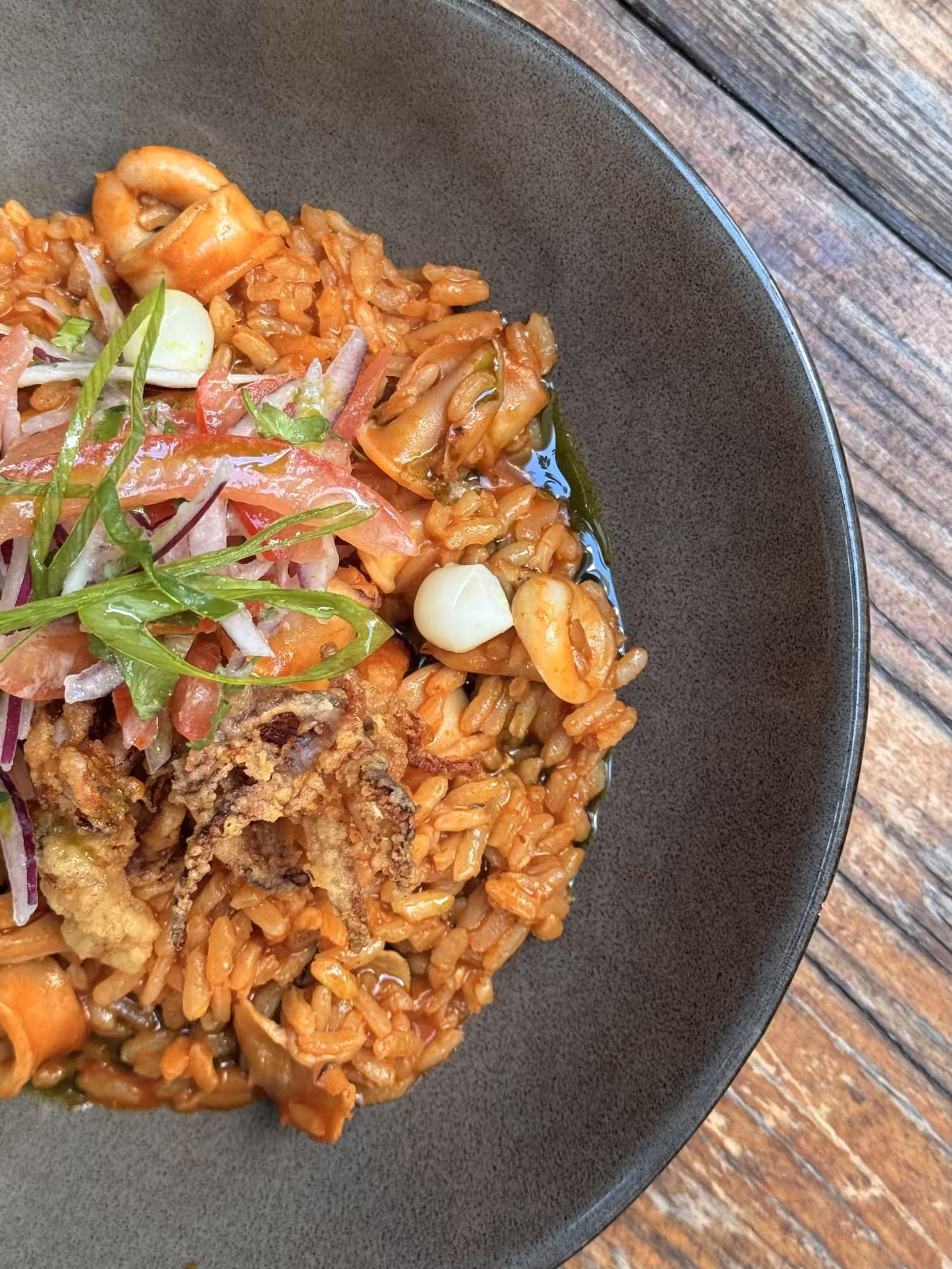Riz au chipirón, calamars sautés à la péruvienne servis au Jules-Edouard à Genève