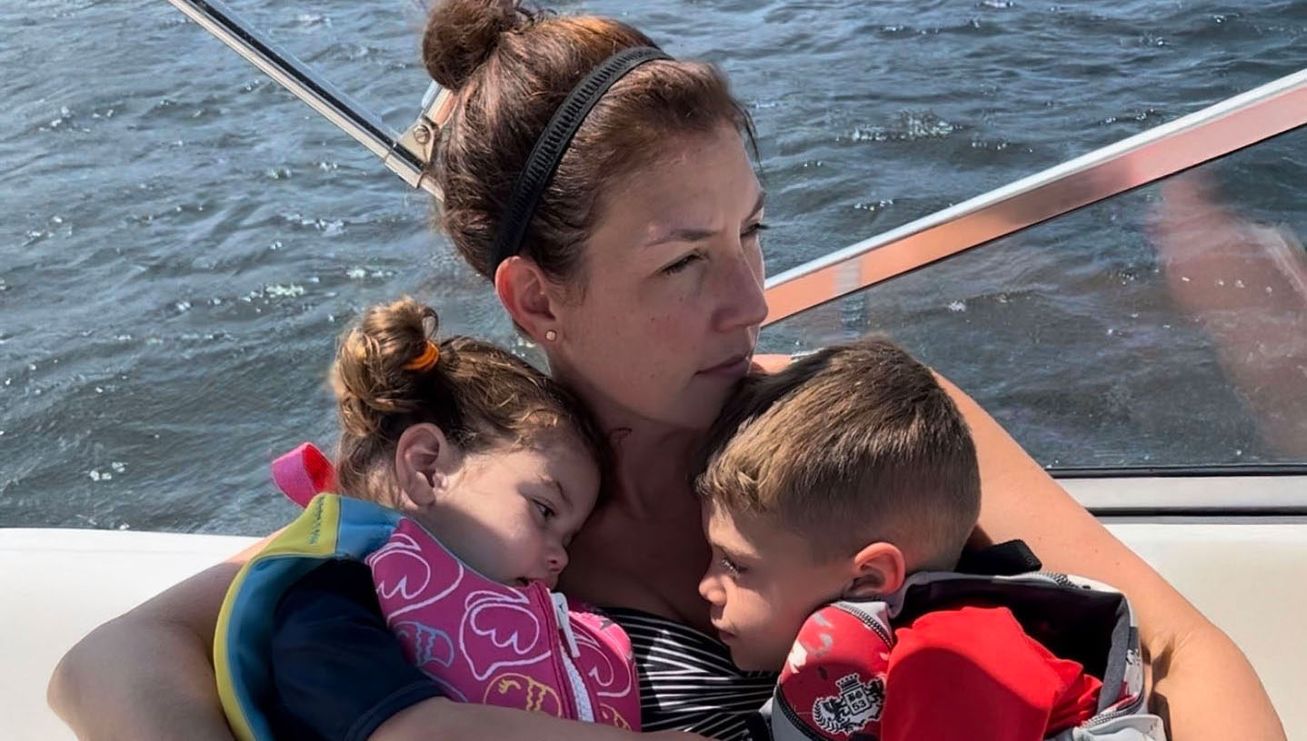 Audrey Staples boating with her children