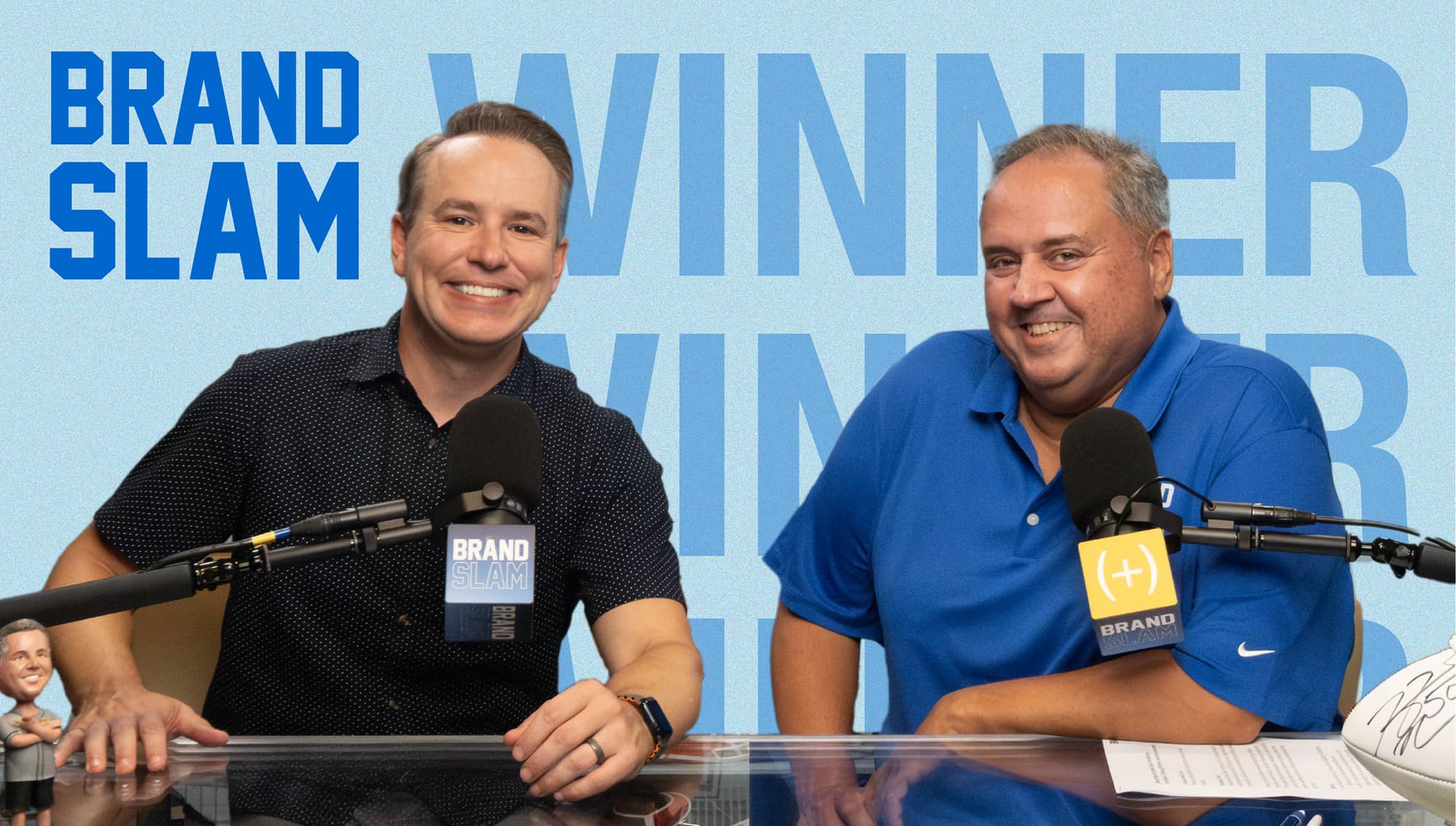 Steve Rosa and Joe Kayata at the Brand Slam podcast table with microphones.