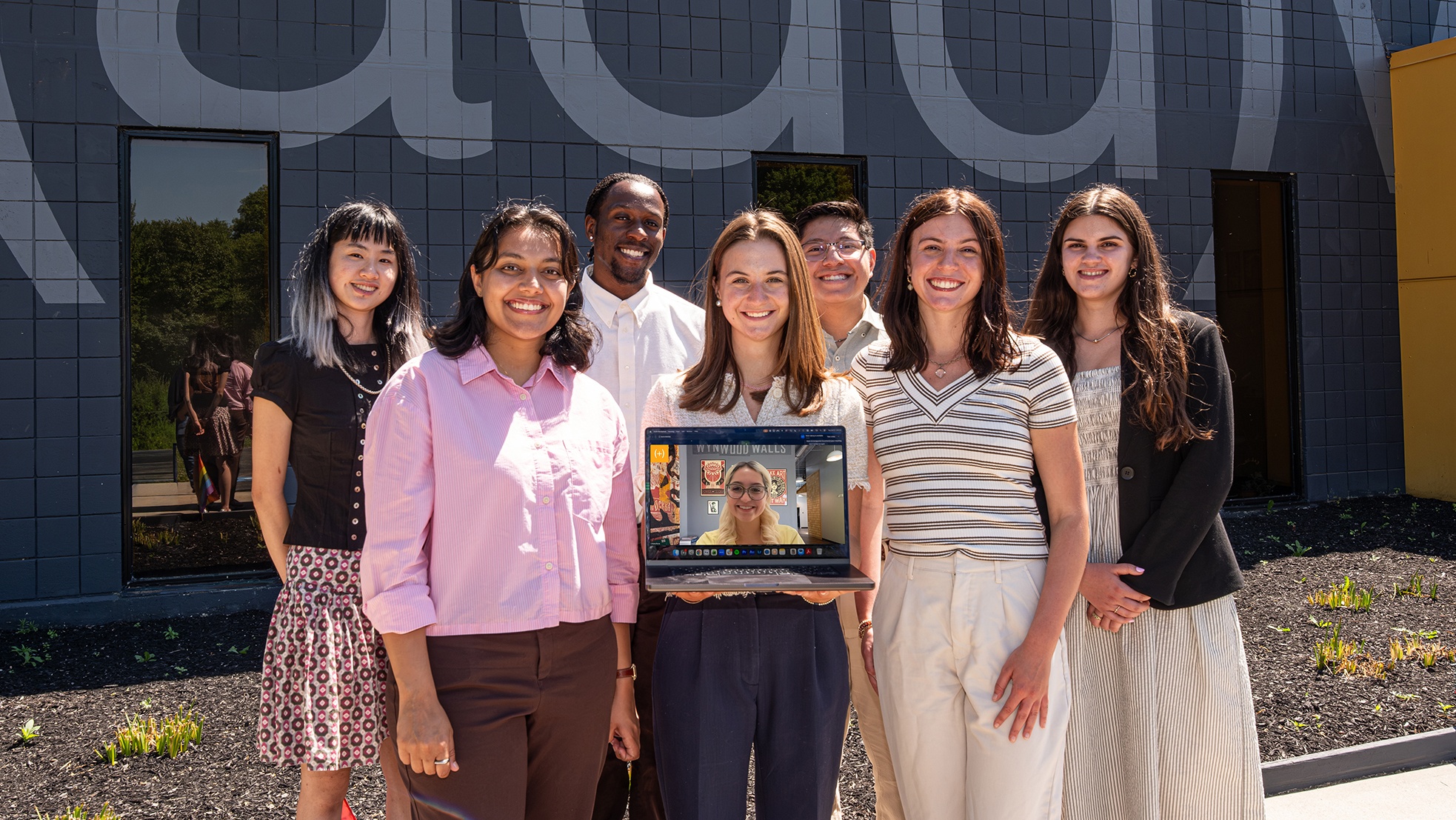 Intern team posed outside office