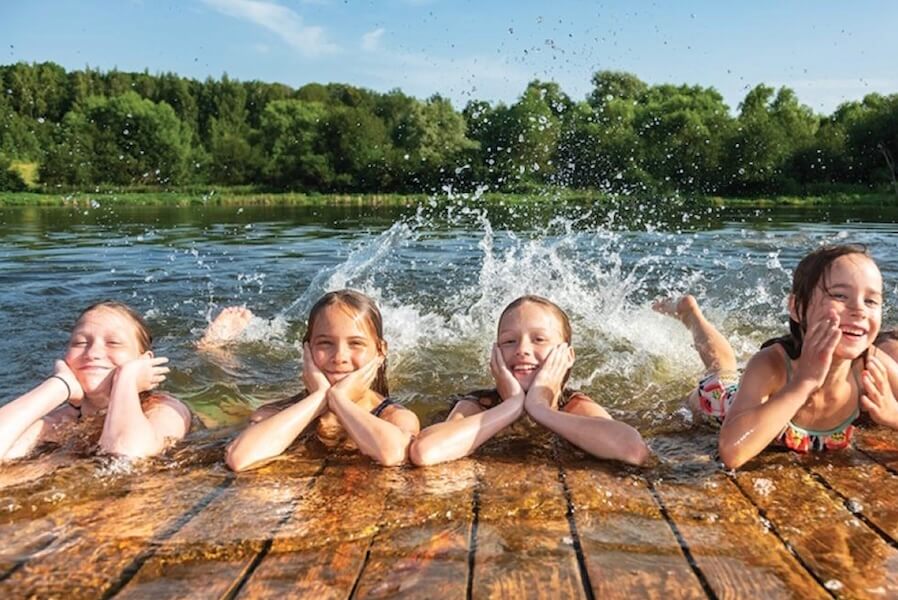Children enjoying Bay Area summer camps with outdoor and hands-on activities