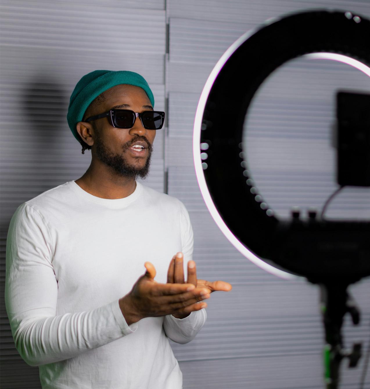 Content creator making a video with spotlight 