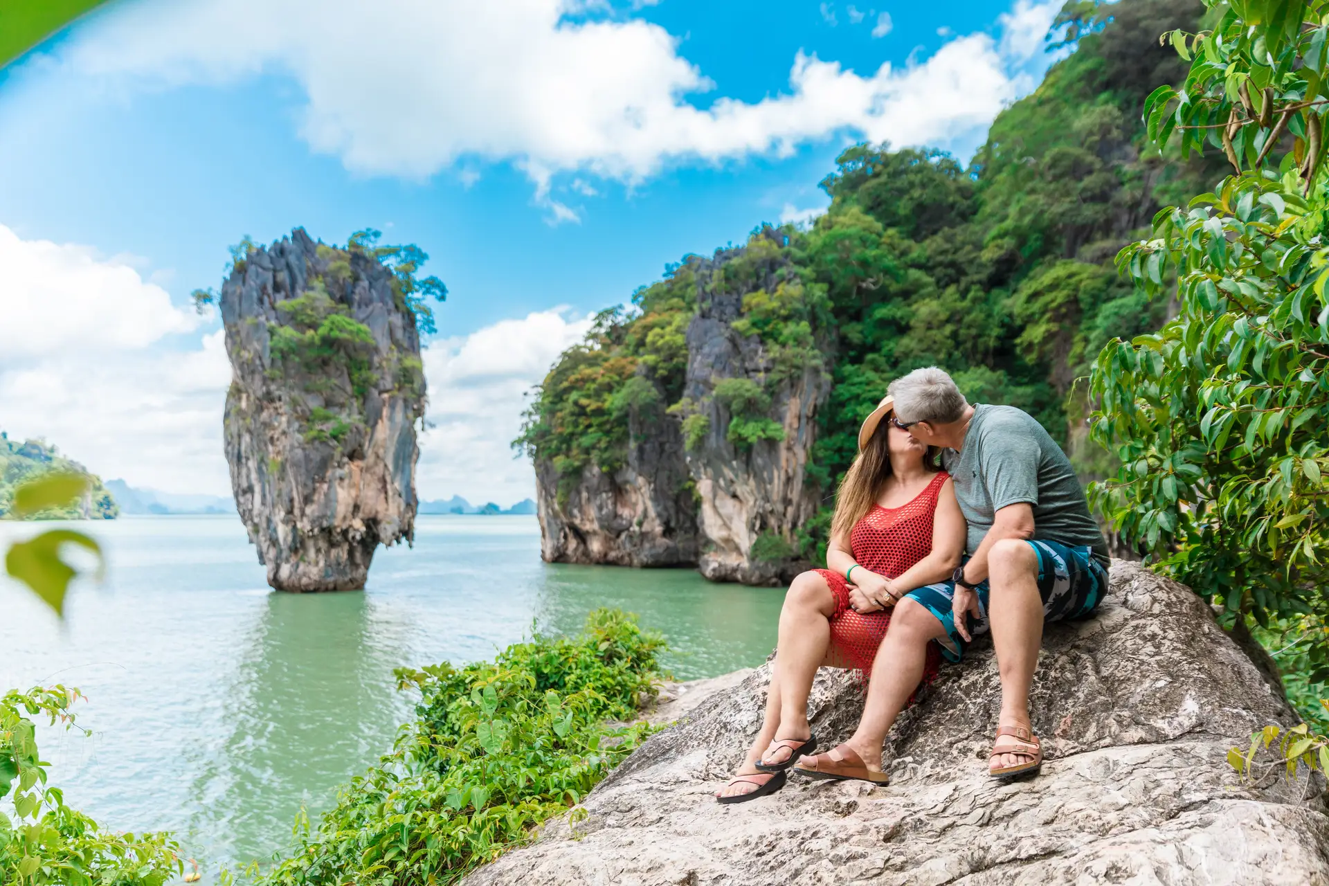 Couple at James Bond Island (Ko Tapu), Phang Nga Bay, Phuket — a popular day tour from Phuket with iconic limestone scenery
