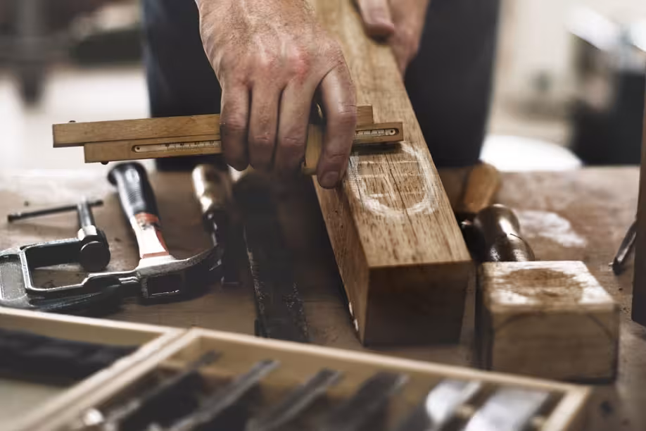 Positive Design's sustainable practices' such as using certified wood and composites.