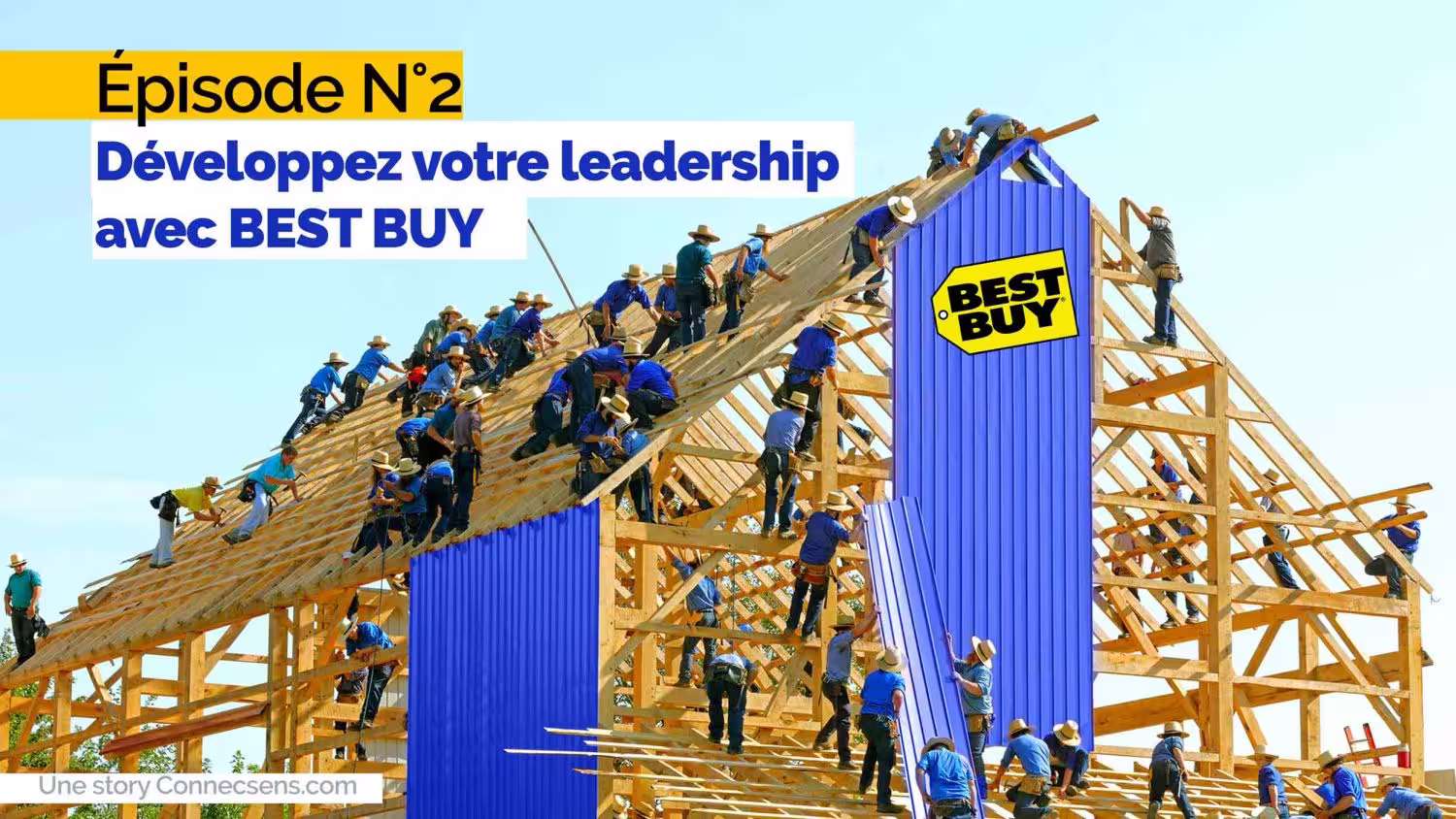 Un gran grupo de personas construyen juntos un marco de madera, un símbolo de colaboración y liderazgo colectivo, con el logotipo de Best Buy en primer plano.
