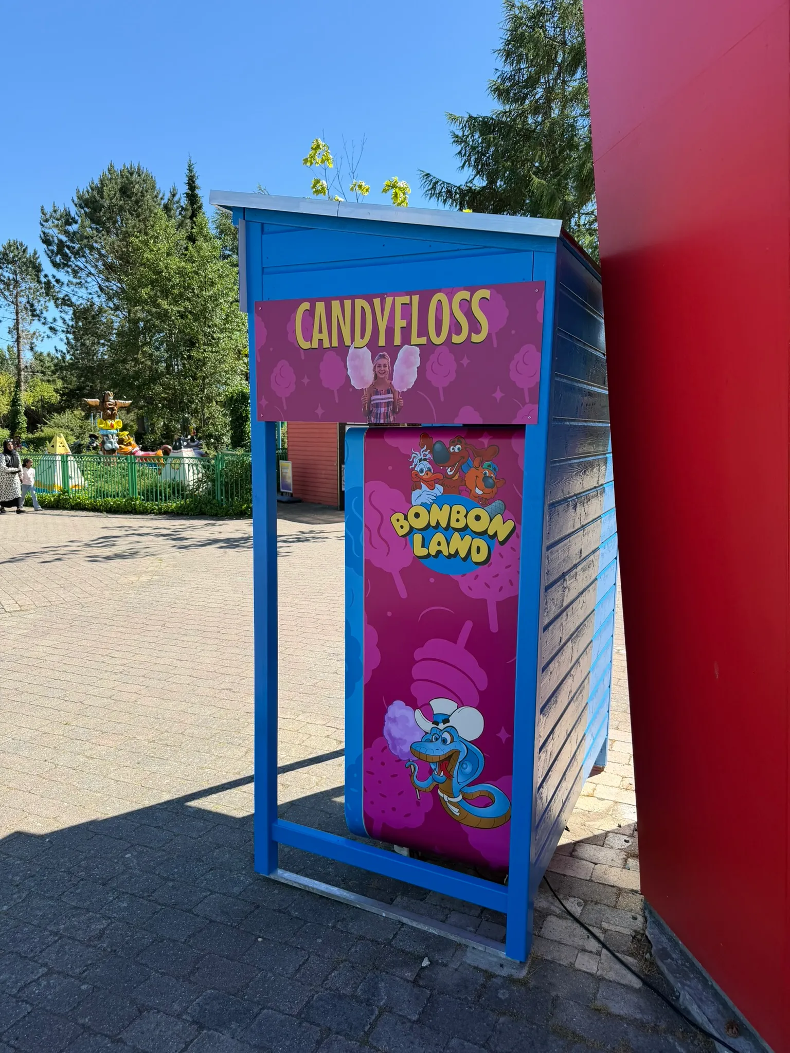 Guest ordering cotton candy on the touchscreen of a Vend-Me machine