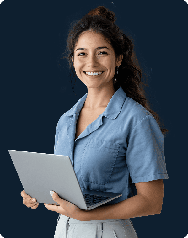 Smiling woman wearing a blue shirt holding an open laptop against a dark background.