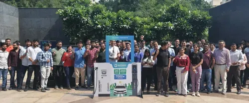 Exicom team group photo outdoors.