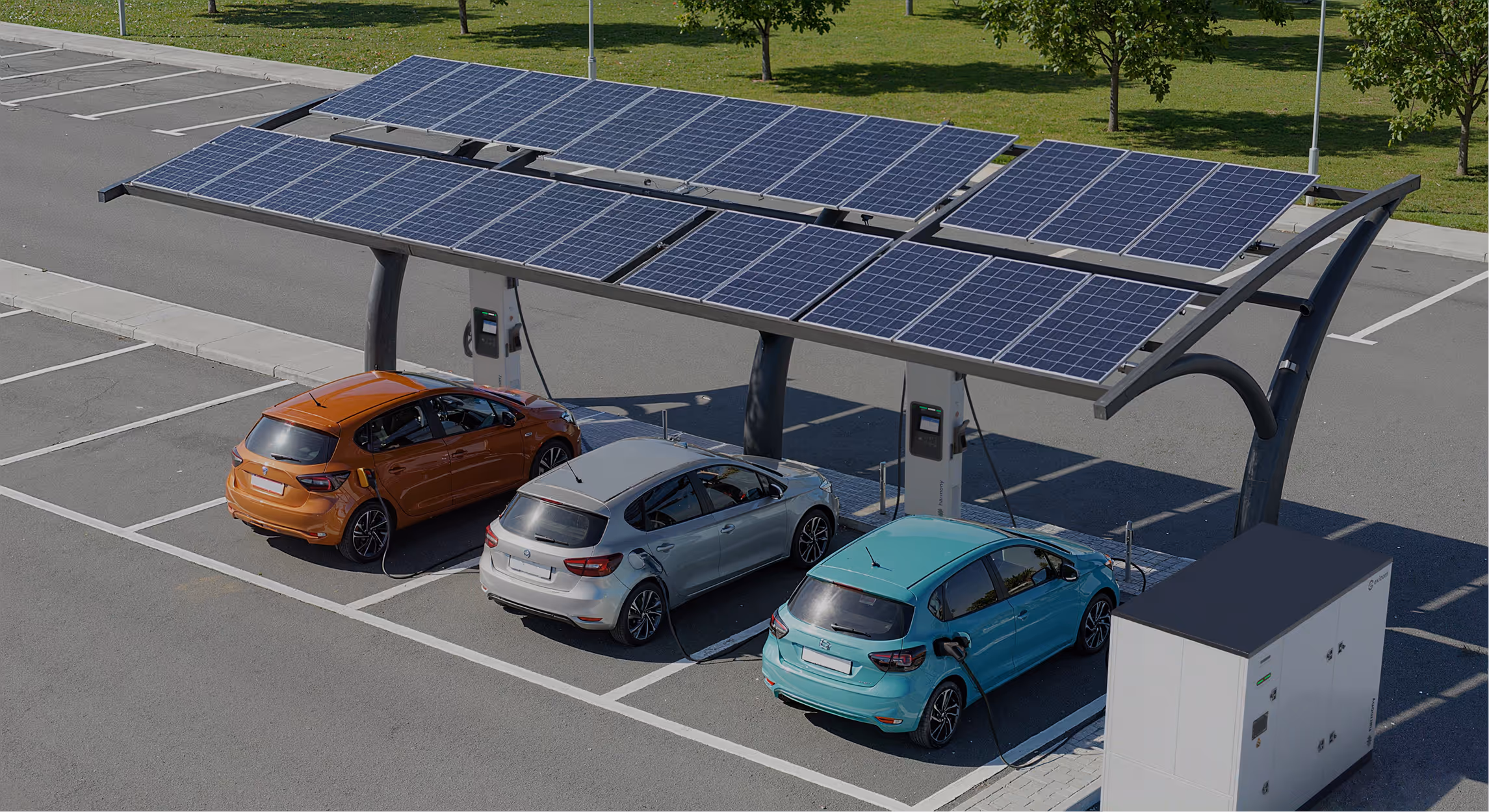 EV charging scene showing Exicom's distributed charging system and a harmony boost
