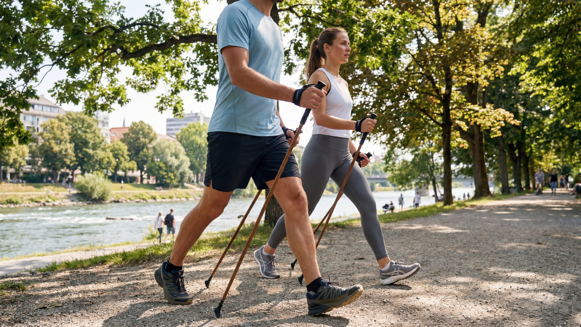 Healthy couple Nordic Walking with HiWalking poles across natural, rocky terrain