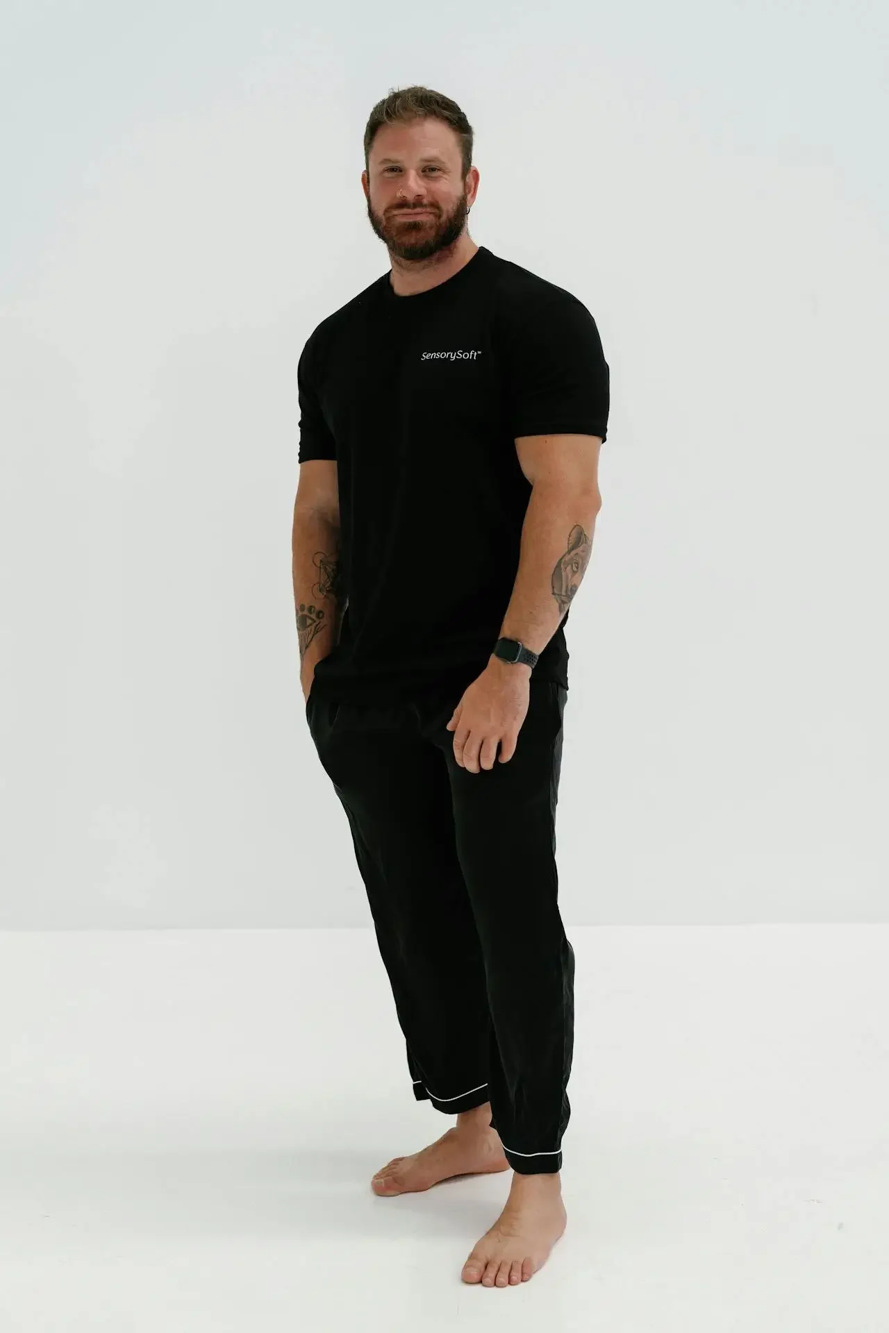 Black t-shirt from Sinners worn by a guy
