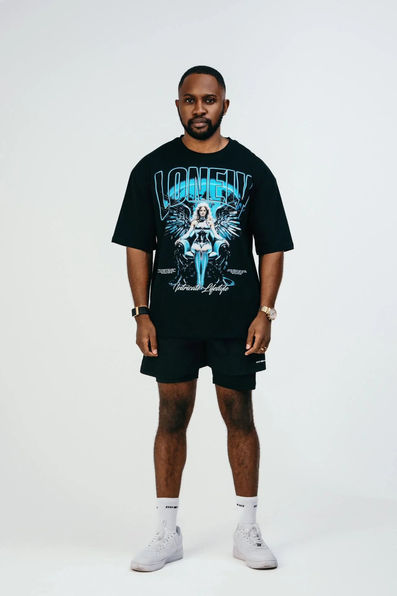 Guy rocking a gray Sinners t-shirt
