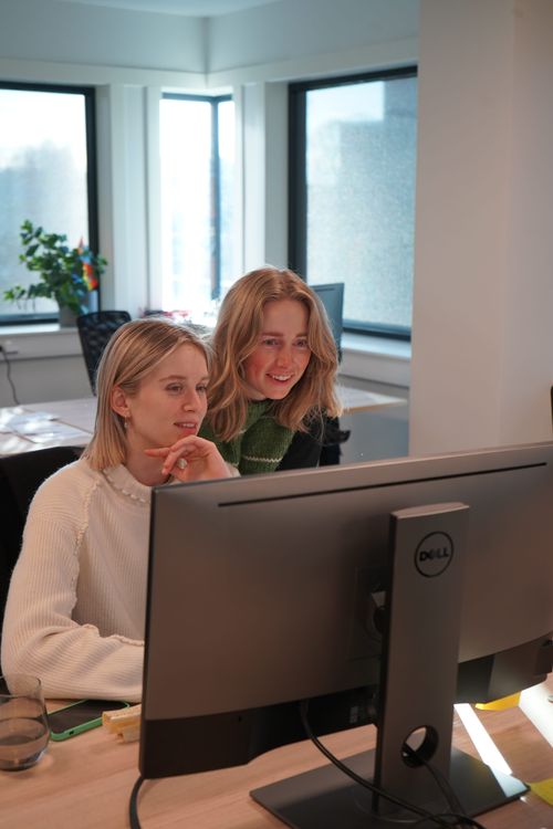 Two happy Gture designers collaboration on a project