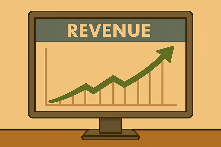 A computer showing a graph with increasing revenue.