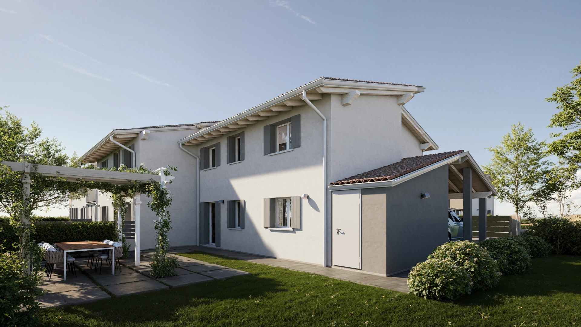 Ampio giardino nel retro con tavolo e pavimento esterno - Le abitazioni - Residenza Molinèa