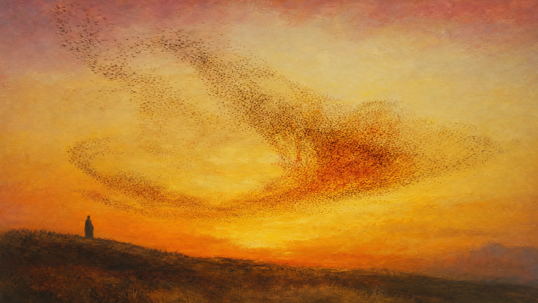 A vast starling murmuration sweeps across a pale rose-grey dusk sky above a quiet valley.