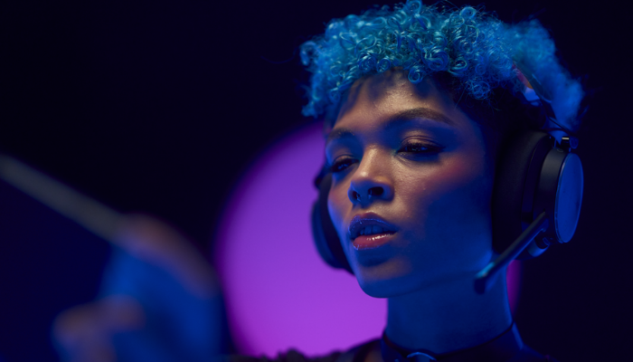 young women wearing Skullcandy PLYR gaming headset