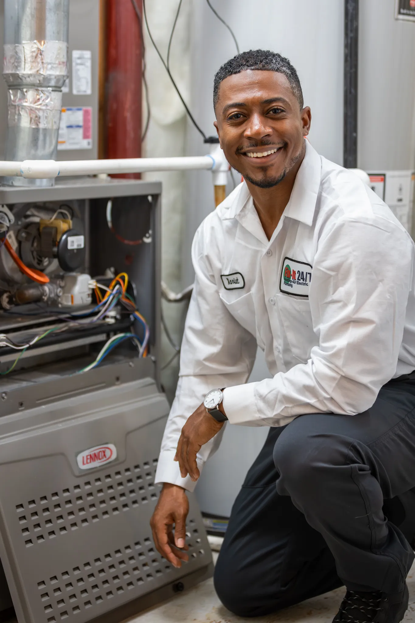 HVAC technician working on a furnace