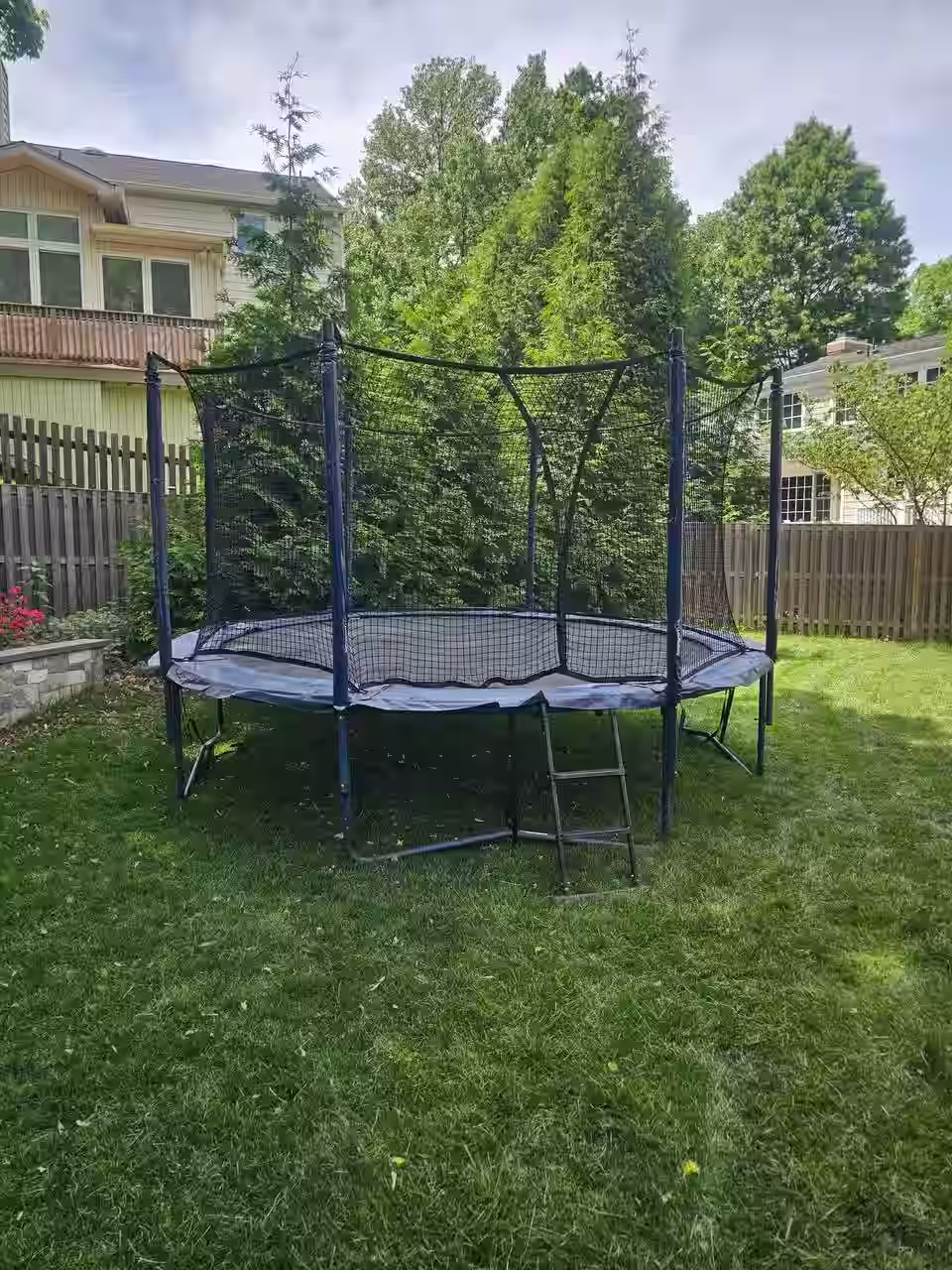 Designing a Kid-Friendly Backyard with an In-Ground Trampoline