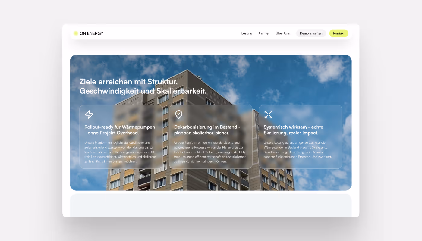 Screenshot of a clean energy site with a city building and floating info cards.