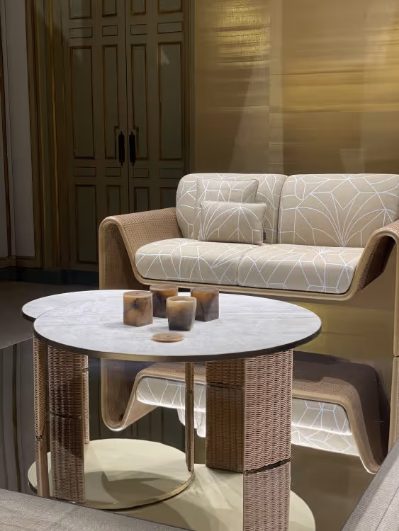 Wicker furniture by Armani / Casa on display inside Villa Orsini.
