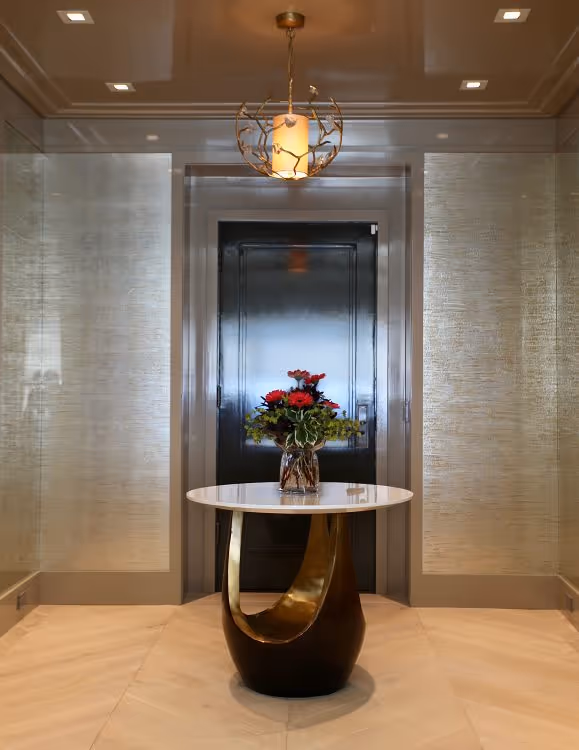 In an entryway by DLN Member Micheal Abrams, Simes Studios devised a shagreen lookalike in églomisé, which was installed in eight screens.