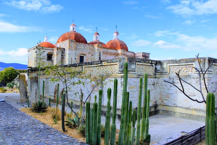 An ancient spiritual site, the Mitla ruins feature unique mosaics and engravings that represent the artistry of Oaxaca's early residents.