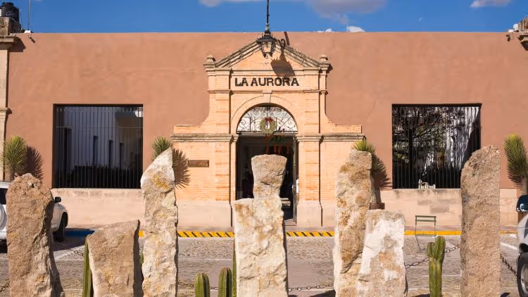 The exterior of La Aurora, a converted textile mill that now serves as studio and gallery space for artisans.
