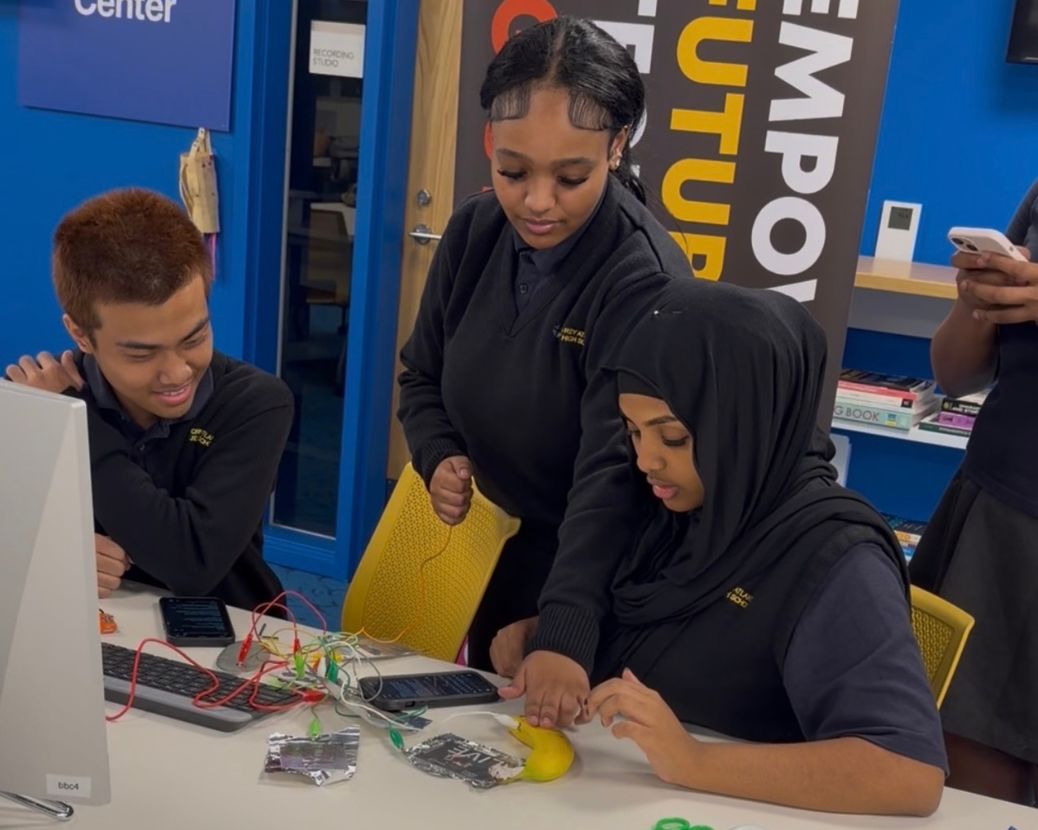 A WCT student building a circuit