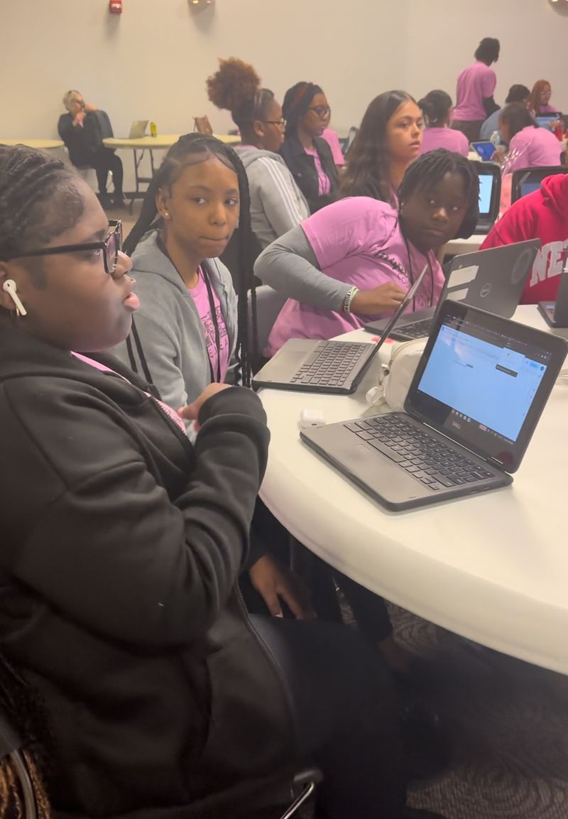 Students working on laptops during a WCT program
