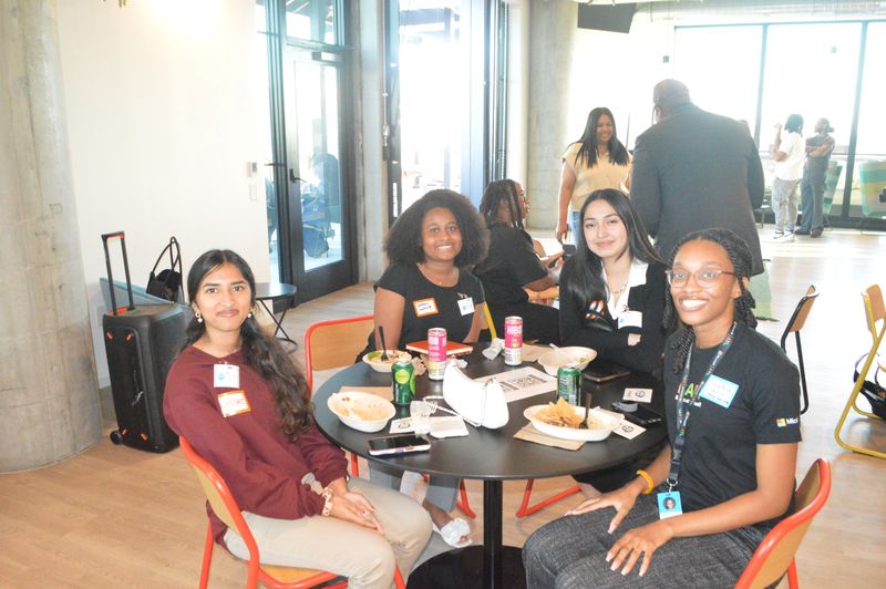 TechRise members sharing a table at a WCT event