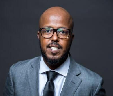 A Headshot of Dennis West.