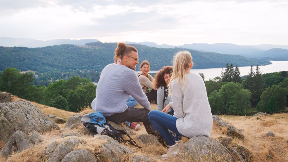 A group of friends on the top of a mountain