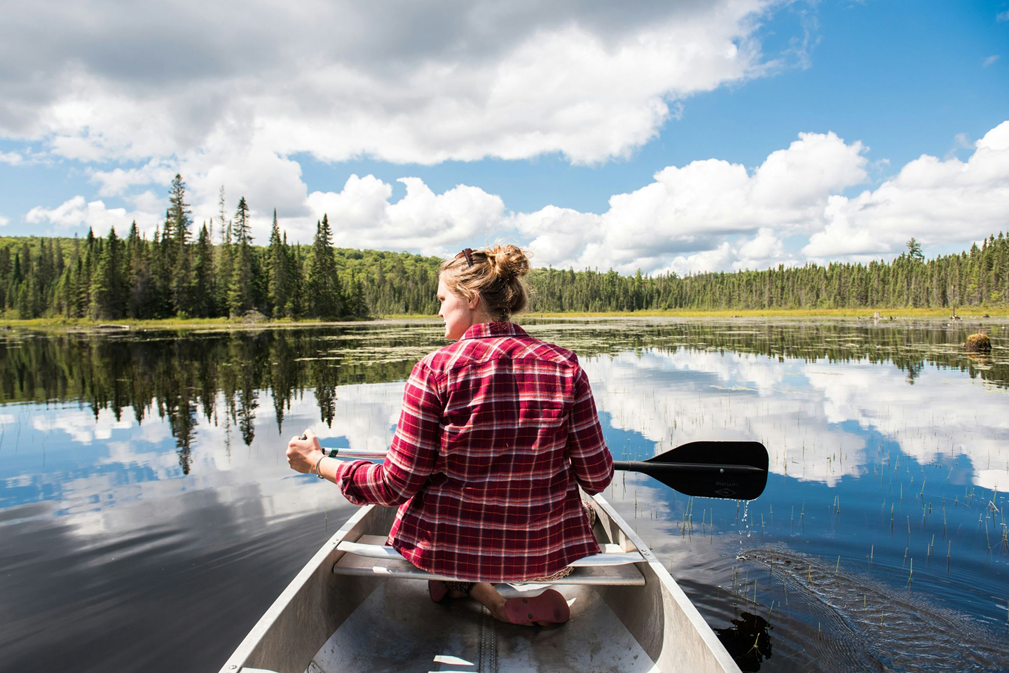Someone to canoeing on the lake