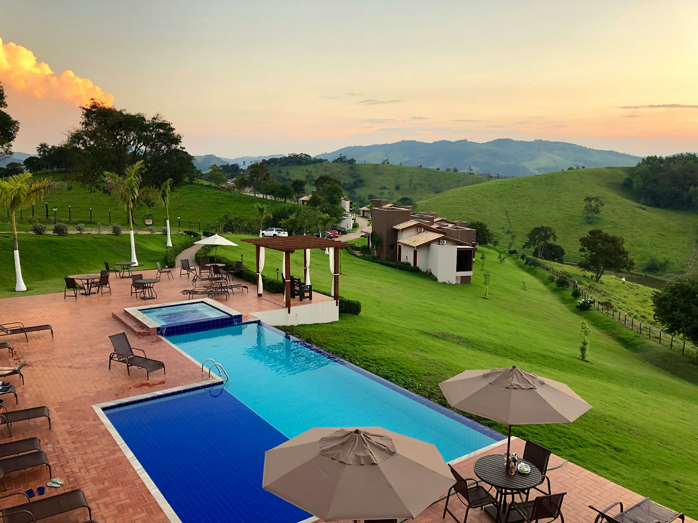 A view of a valley with a pool
