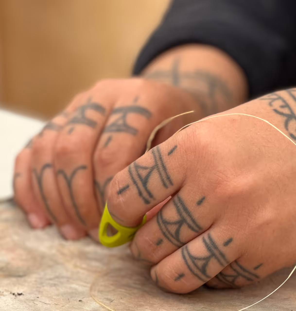 Inuit hands sewing