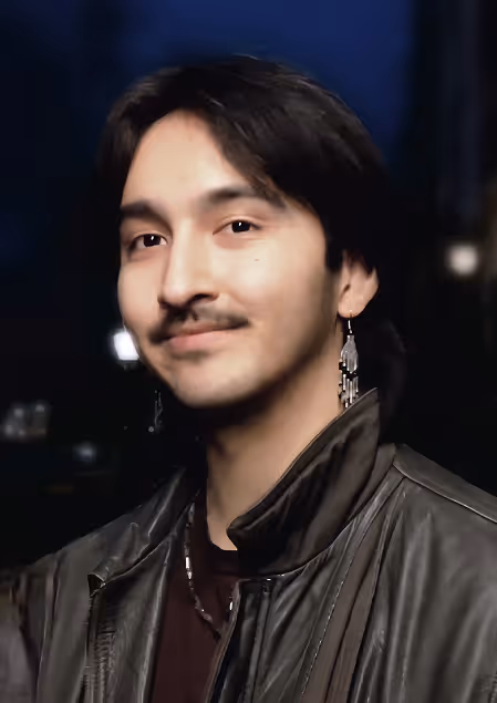 A headshot of Amaasa
